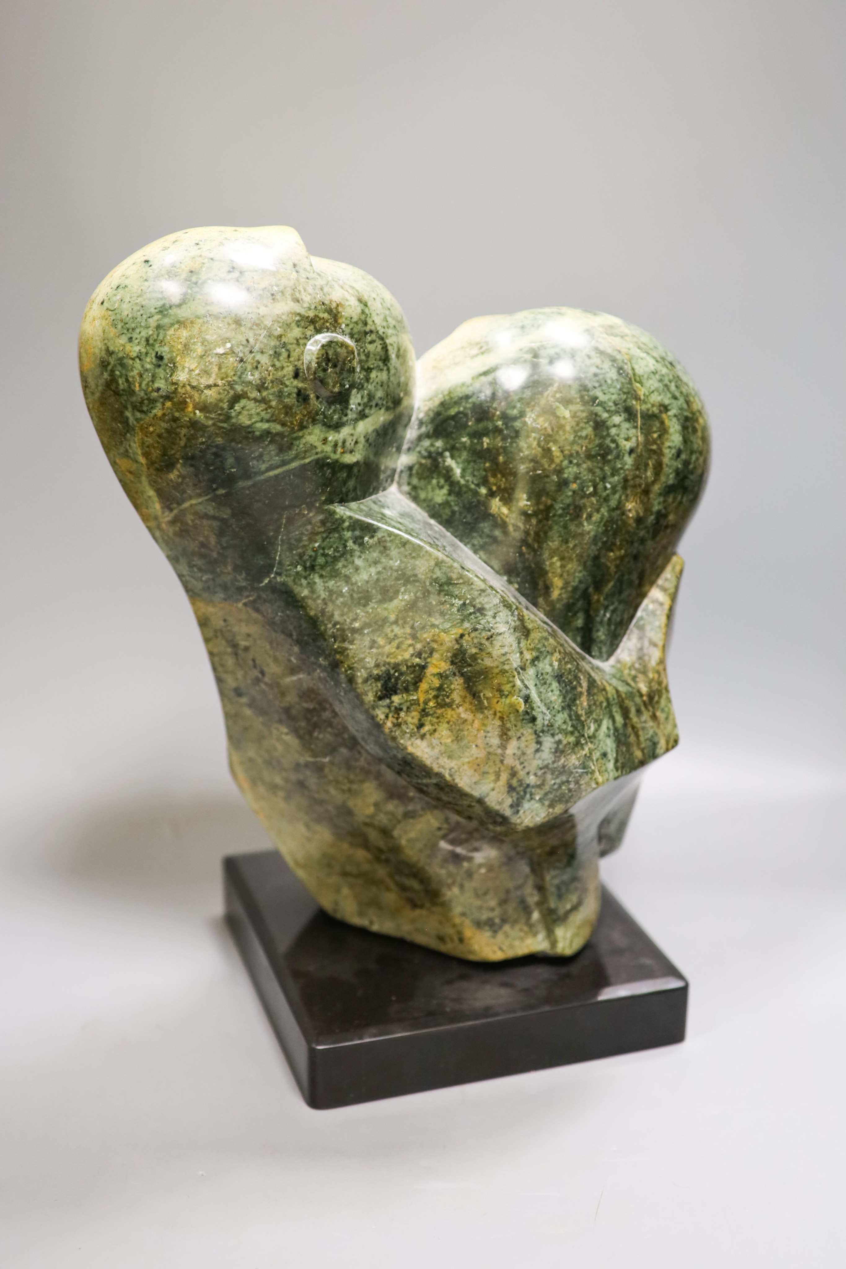 South African soapstone figural carving, mother and child 38cm